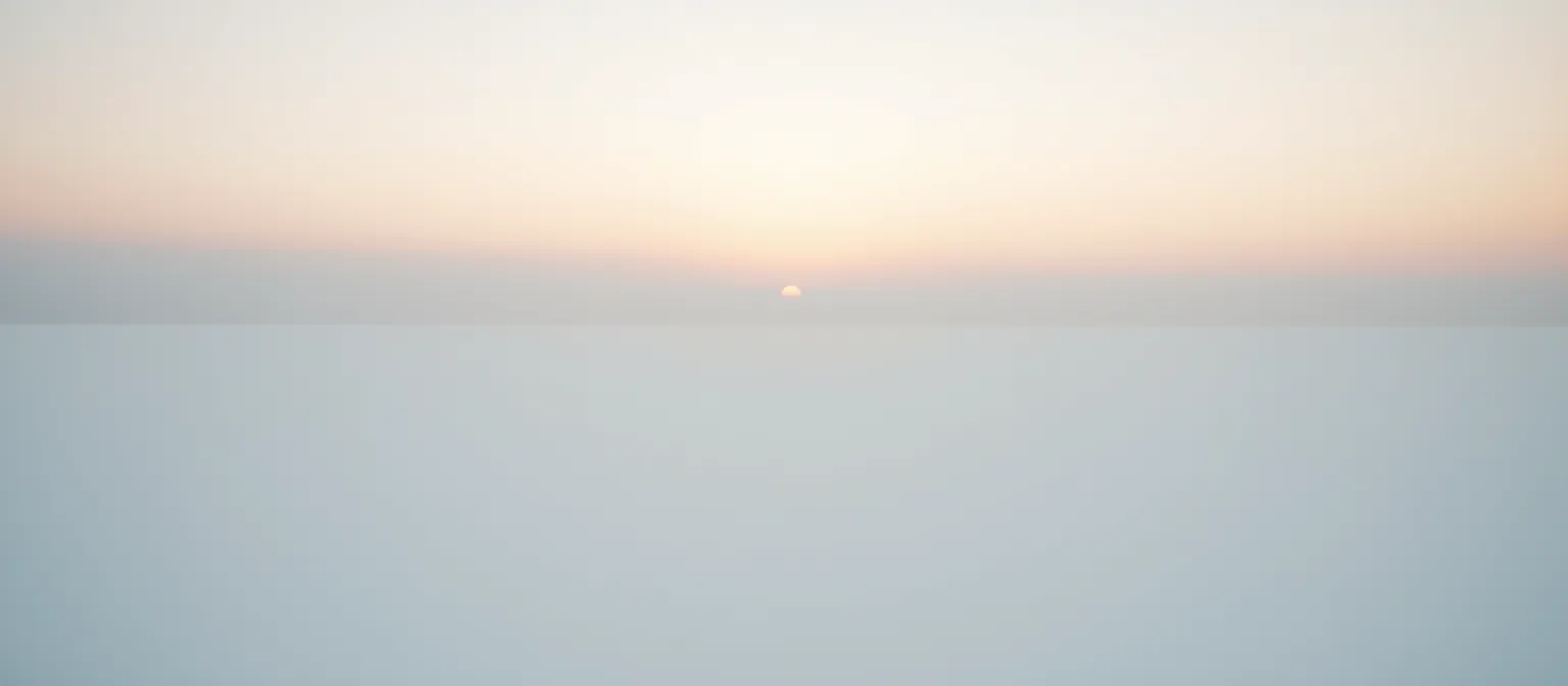 A calm horizon at first light